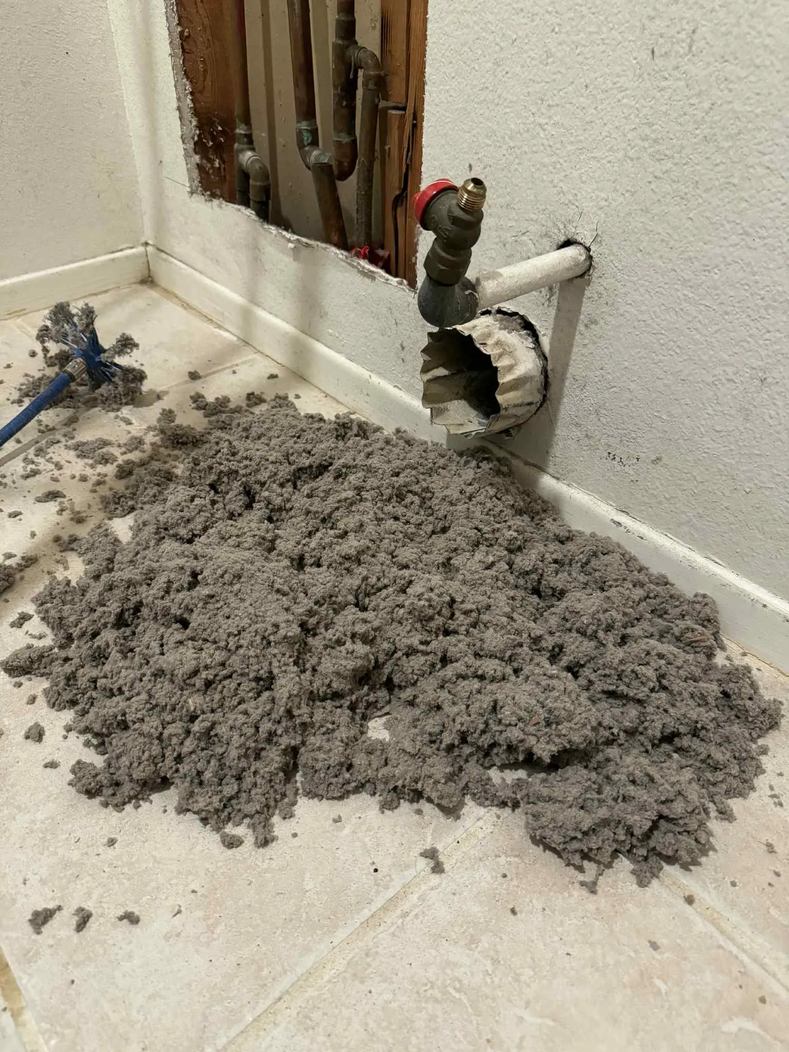 Dryer vent cleaning near me — lint pile pulled from a clogged vent